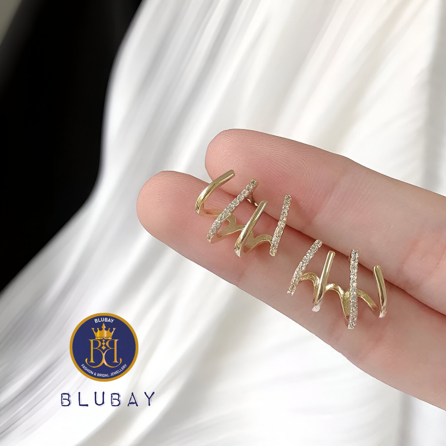 Claw AD and gold plated earrings