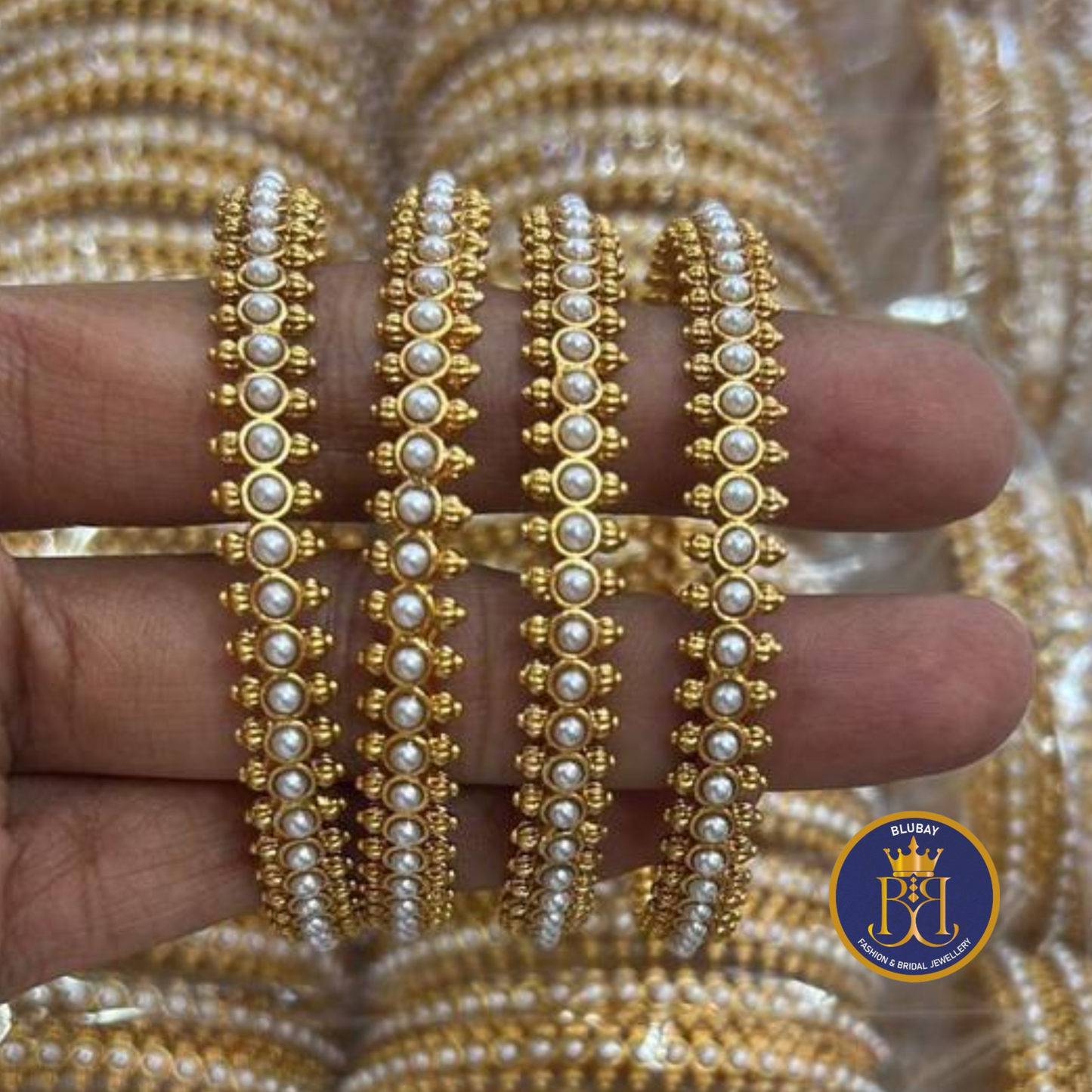 Simple pearls lined antique gold finish bangles set
