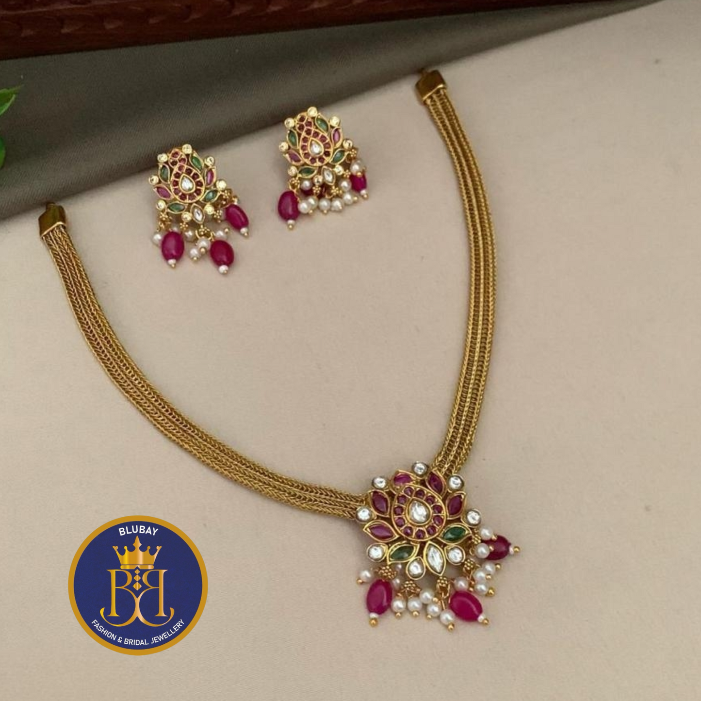 Single Lotus kemp stone studded attigai Necklace set with pearl and beads clusters