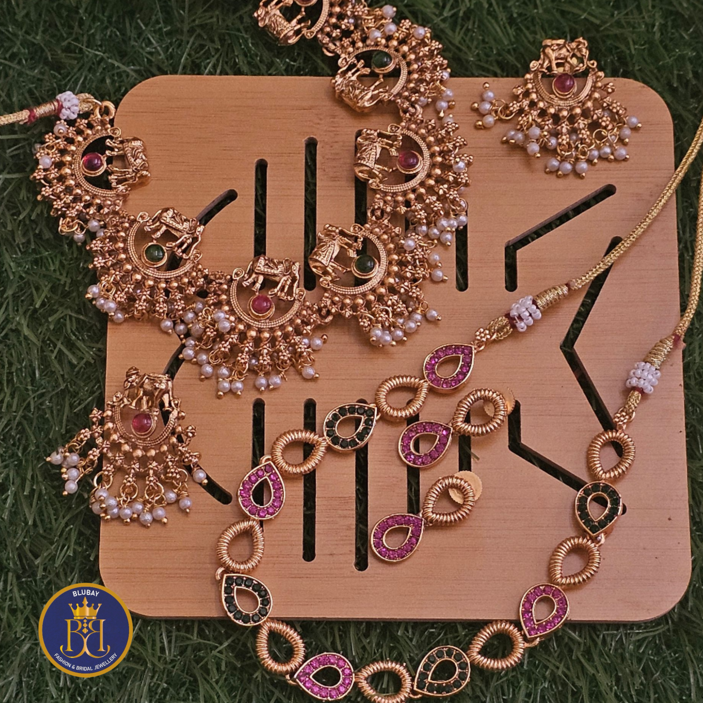 Combo of 2 Necklace sets - 1 Haathi set and 1 Oval AD set