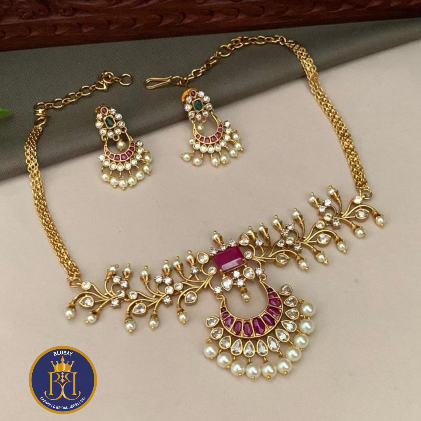 Premium chandbali pendant golden designer kemp and AD Necklace set