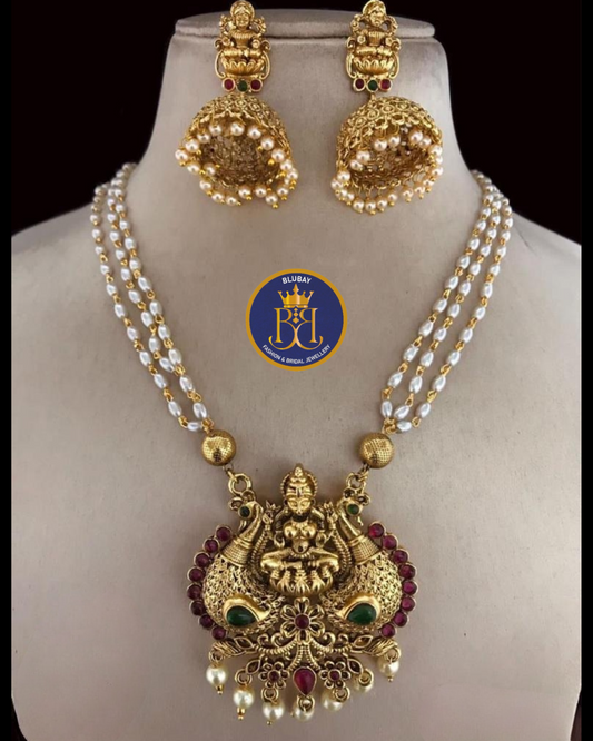 Lakshmi Devi kemp stone layered pearls long haaram set with golden jhumkas