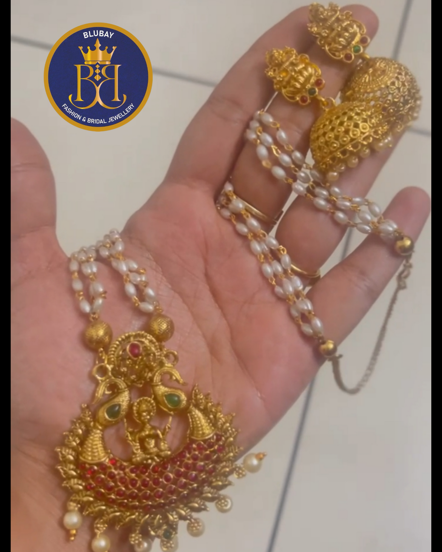 Lakshmi Devi kemp stone layered pearls long haaram set with golden jhumkas