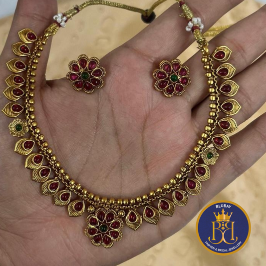 Kemp stone studded floral antique gold Necklace set with Studs