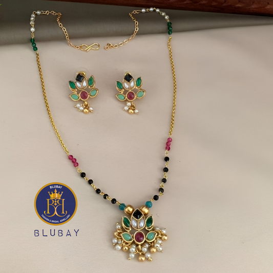 Multicolored Lotus pendant with black beaded golden Mala chain set with pearl clusters