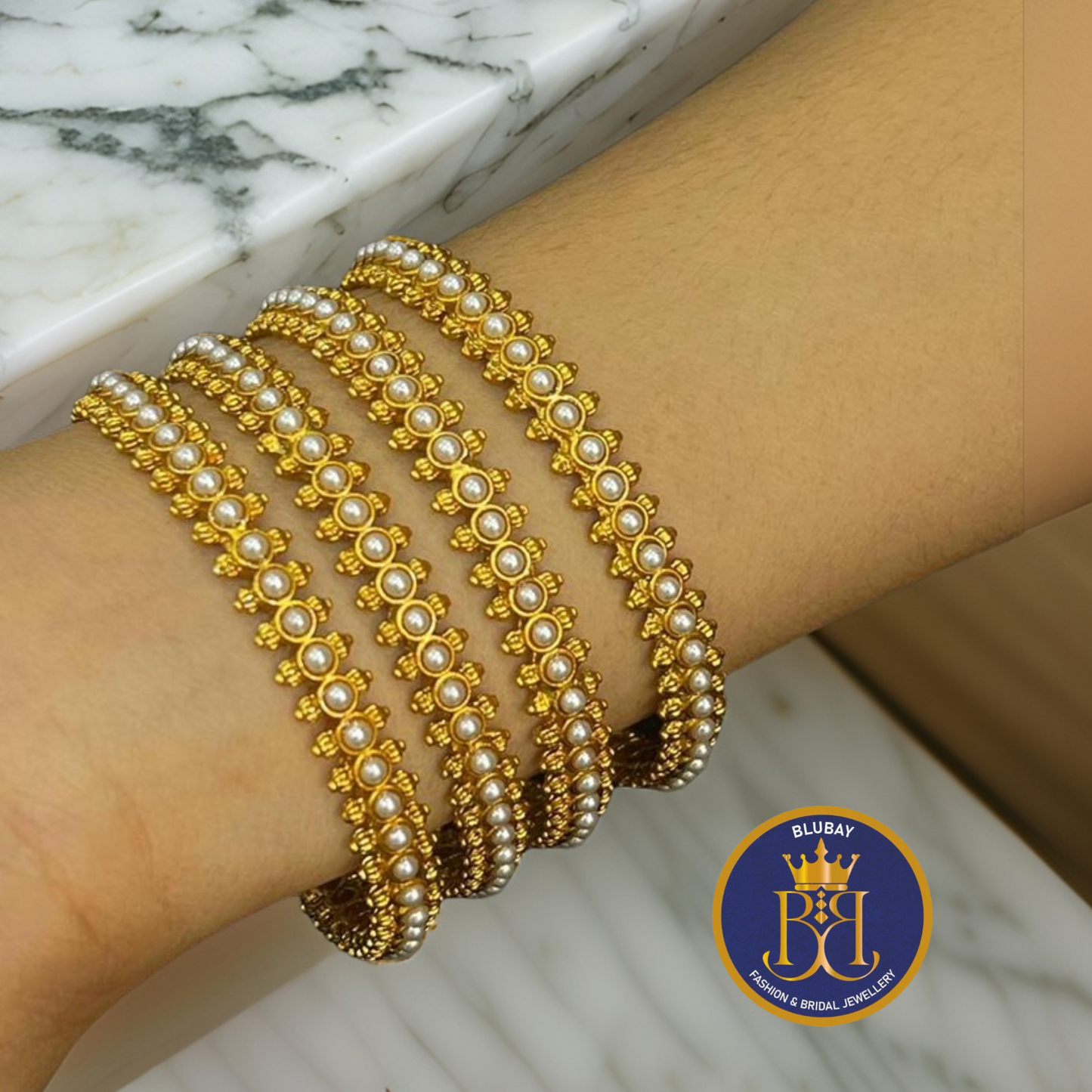 Simple pearls lined antique gold finish bangles set