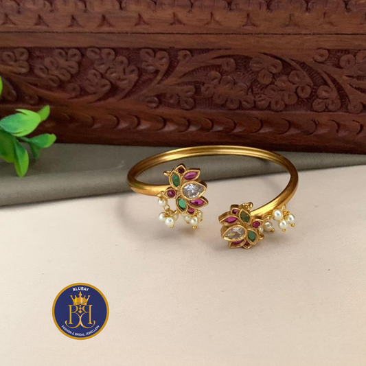 Pearly tasseled Kemp Lotus flower gold toned adjustable Kada Bangle