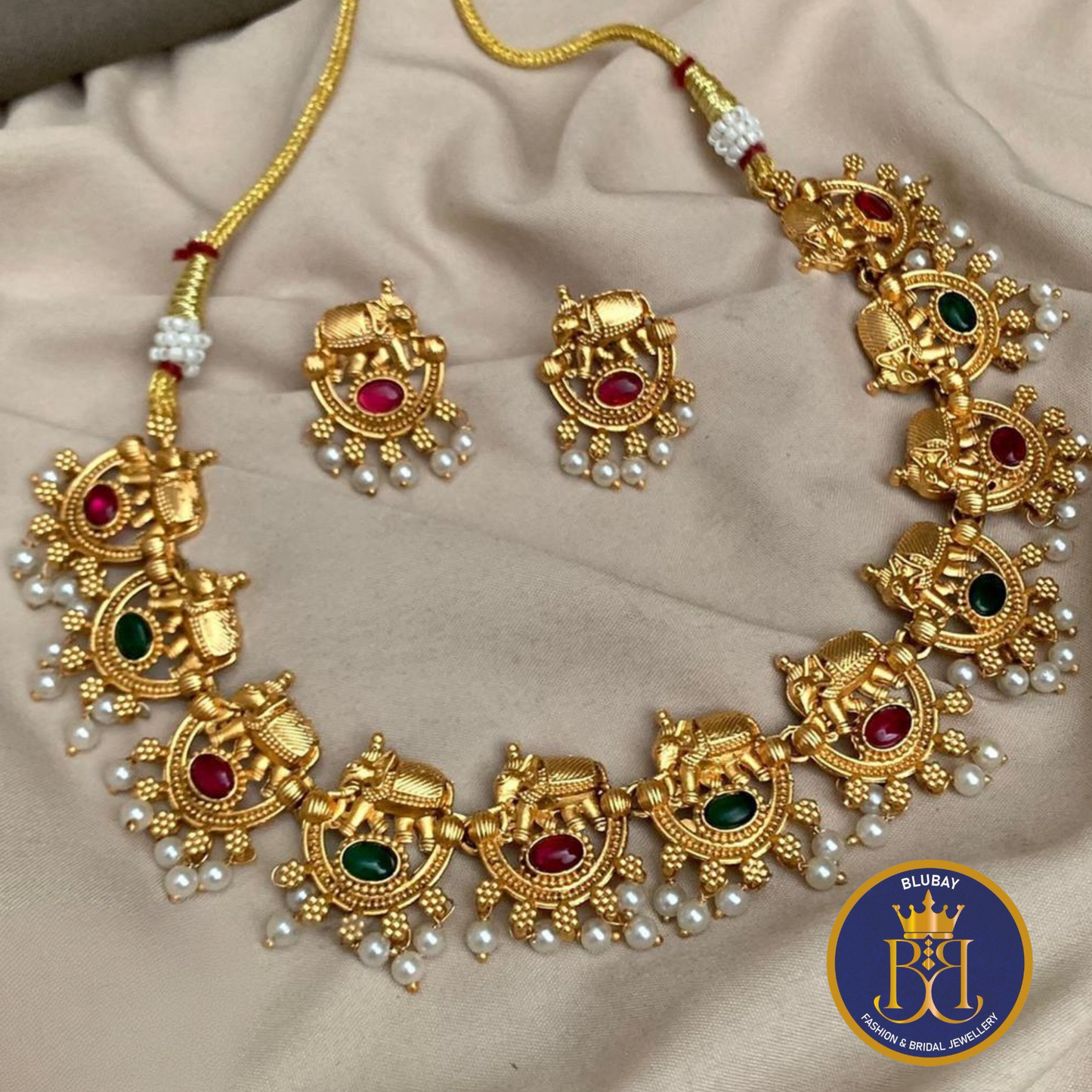 Red and green stone Haathi golden pearl drops Necklace set