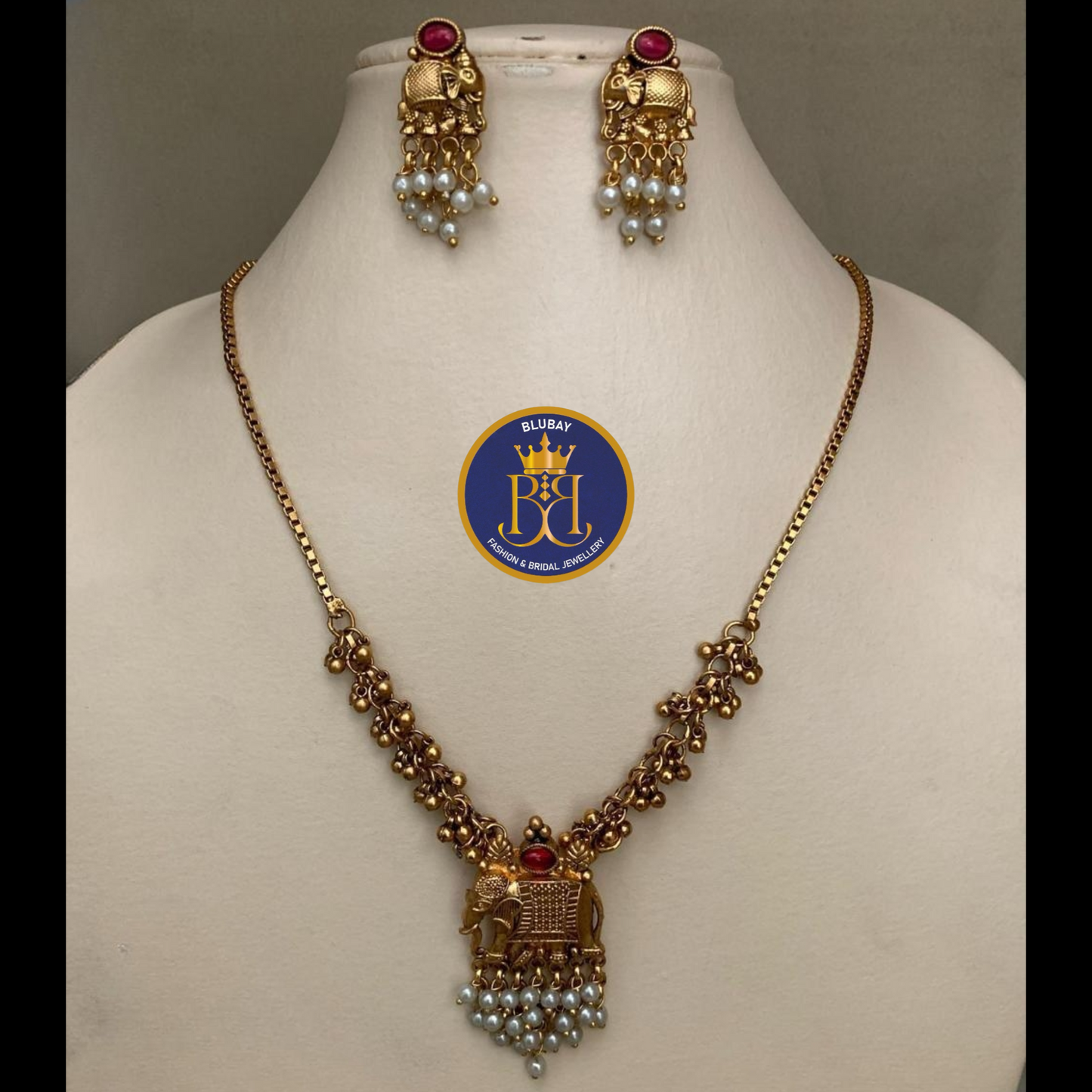 Airavatham golden ghungroo and pearl cluster Pendant chain Haaram set