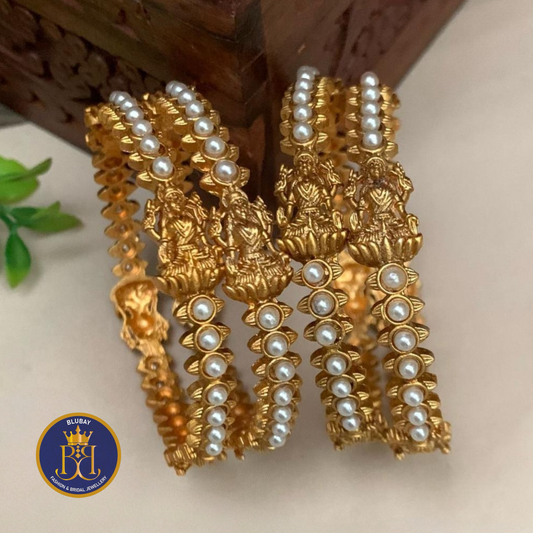 Devi white pearls studded golden antique Bangles set of 4