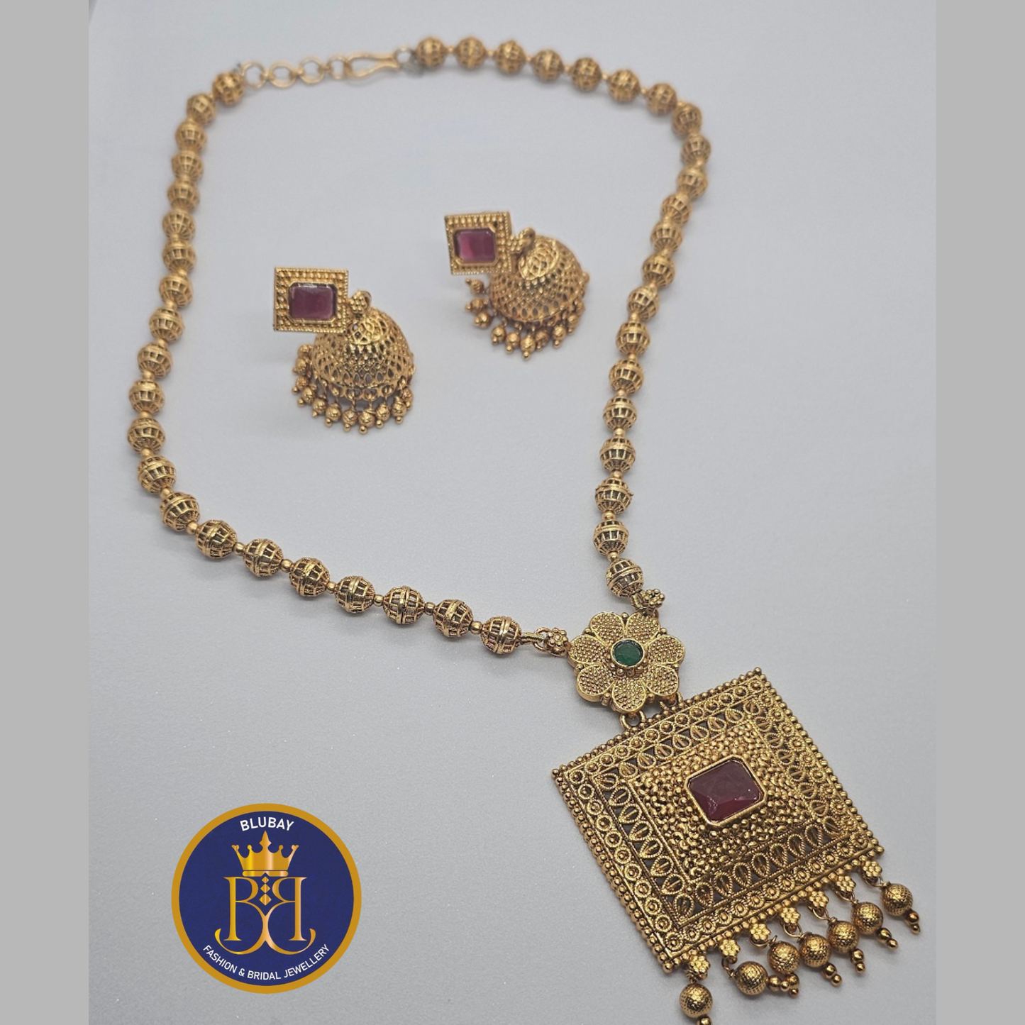 Square pendant designer golden beads haaram set with Jhumkas