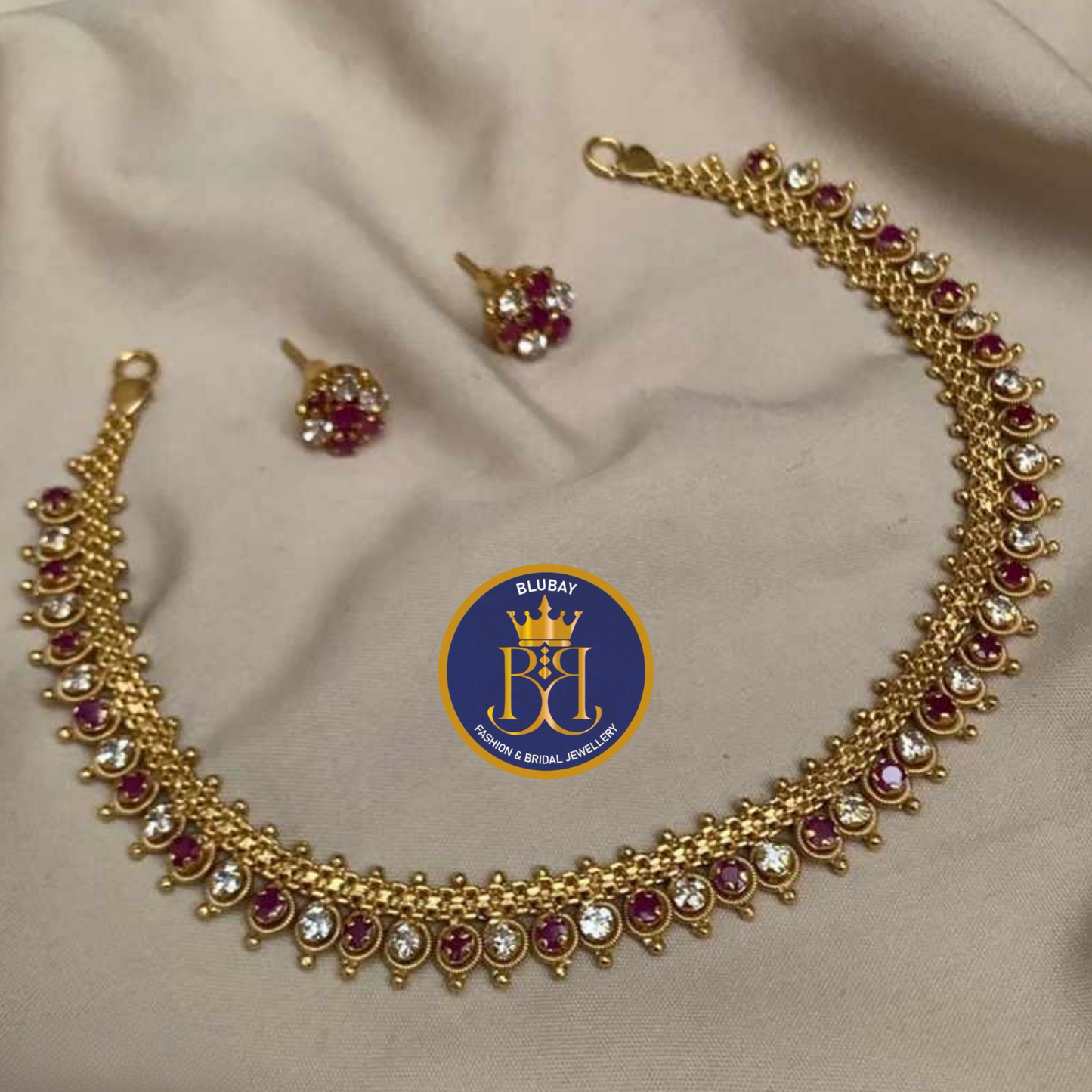 Hasini Ruby pink and white AD golden Necklace set with Studs