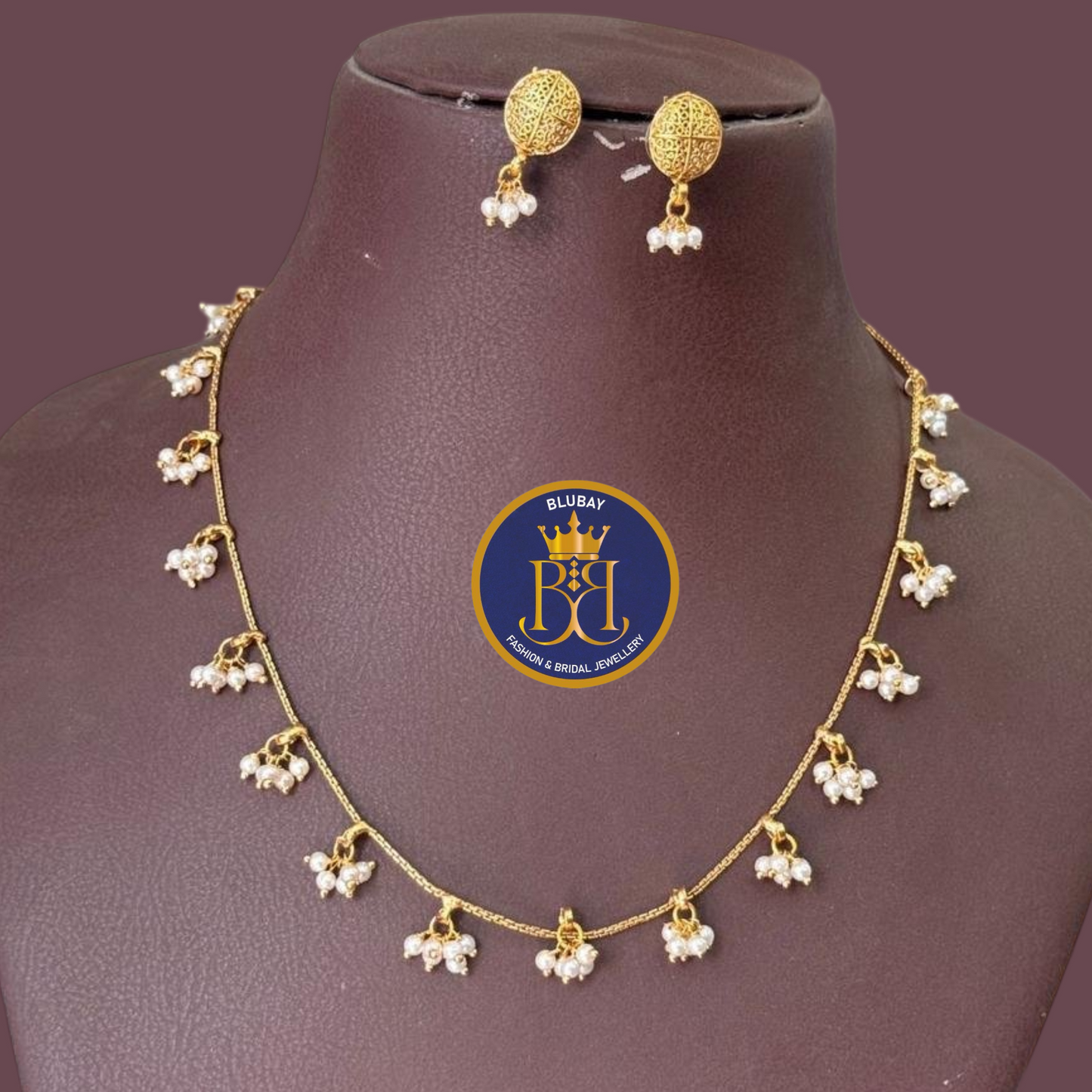 Tharini pearl cluster motifs hanging golden chain Necklace set