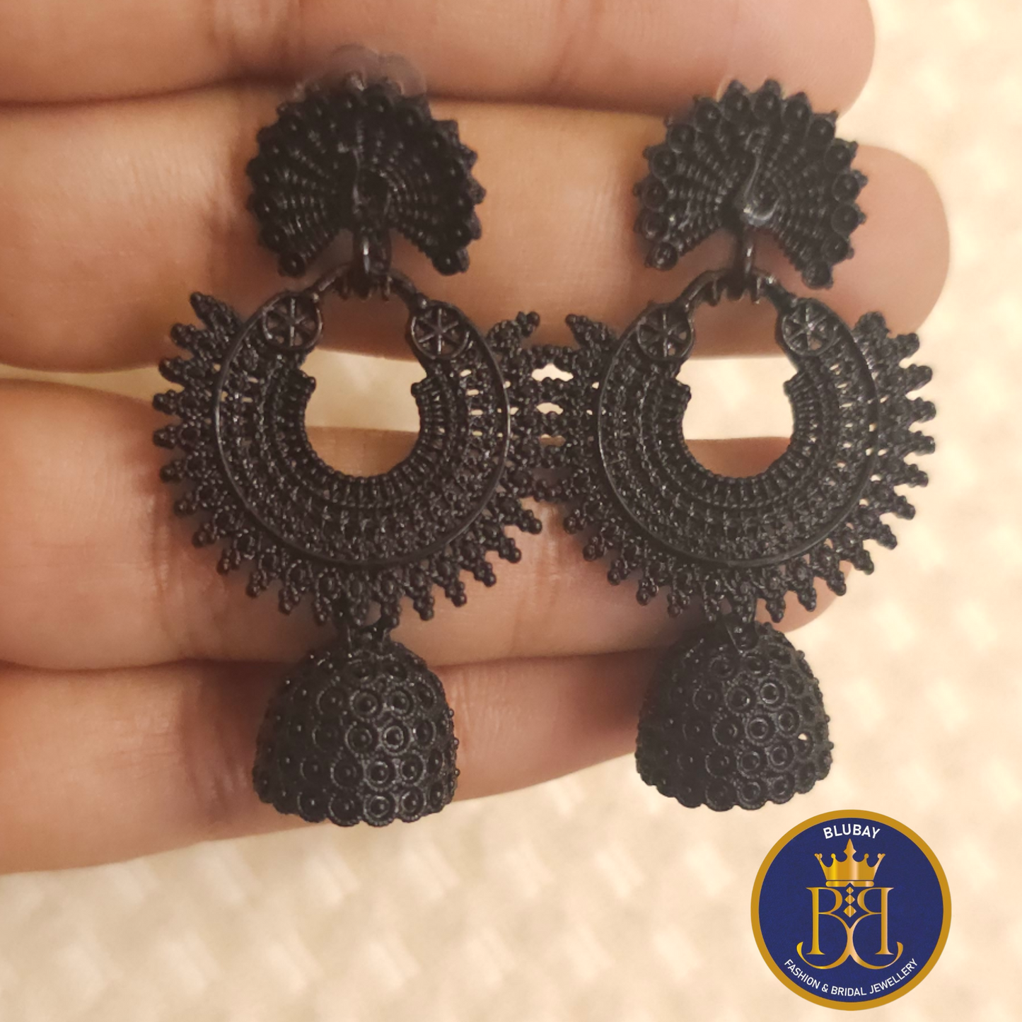 Black polish dancing peacock dangler jhumkas