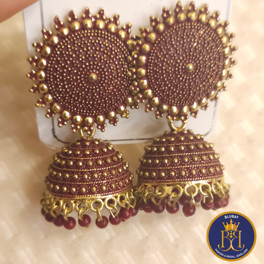 Sooryakanthi dual tone red and gold jhumka earrings