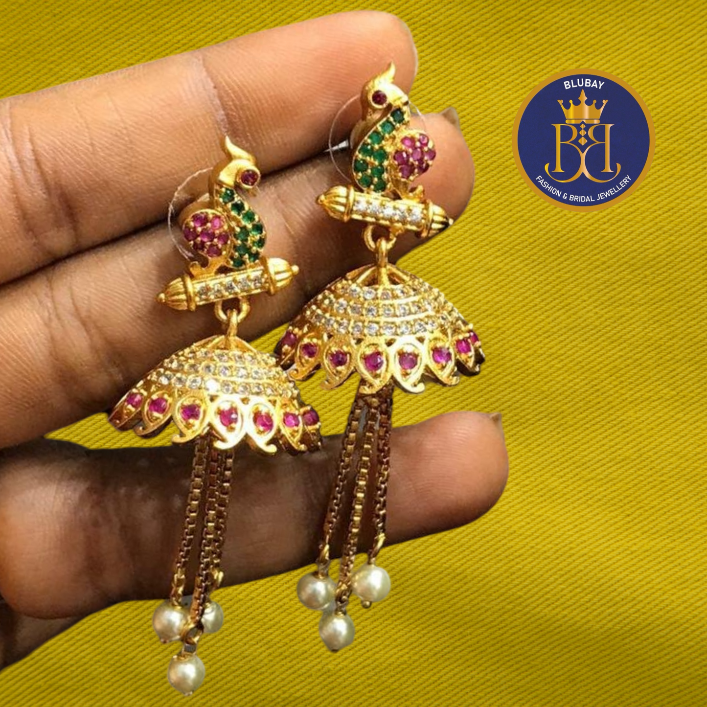 Dancing doll tasseled peacock AD Jhumka earrings