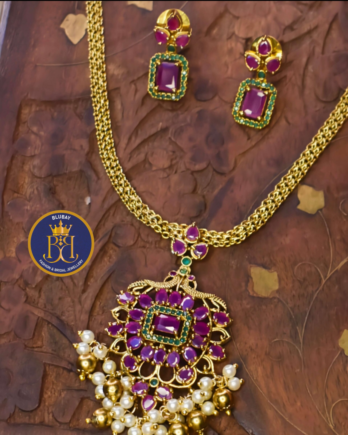 Fuschia premium AD designer pendant golden Choker set with studs